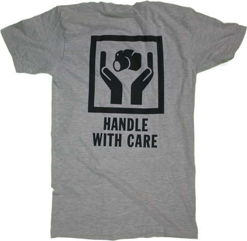 "Handle With Care" T-Shirt by GachaFilm